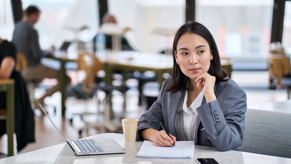 Female executive thinking